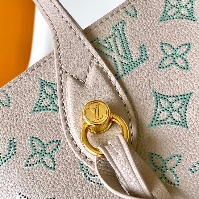 BLOSSOM 20 IN LIGHT BEIGE MAHINA CALFSKIN