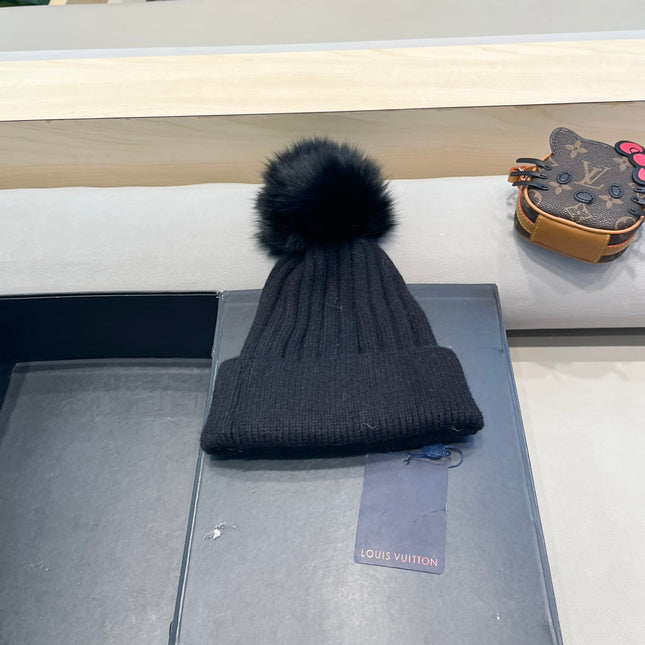 KNITTED BEANIE HAT IN BLACK WOOL AND FOX FUR 409788