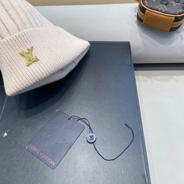 KNITTED BEANIE HAT IN LULLABY PINK WOOL AND FOX FUR 409792