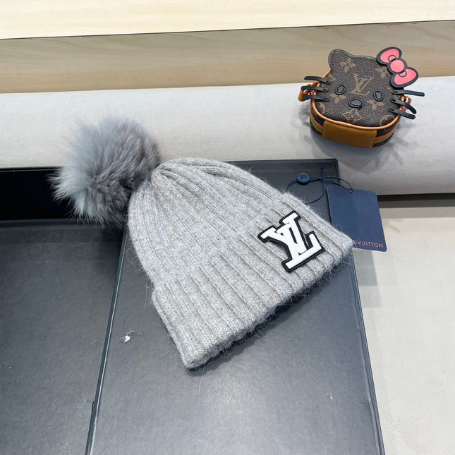 KNITTED BEANIE HAT IN GRAY WOOL 413367