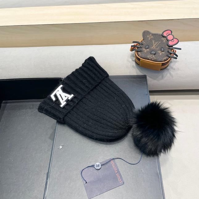 KNITTED BEANIE HAT IN BLACK WOOL 413369