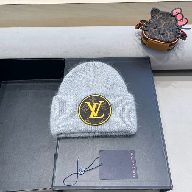 KNITTED BEANIE HAT IN LIGHT GRAY WOOL AND RABBIT FUR 417755