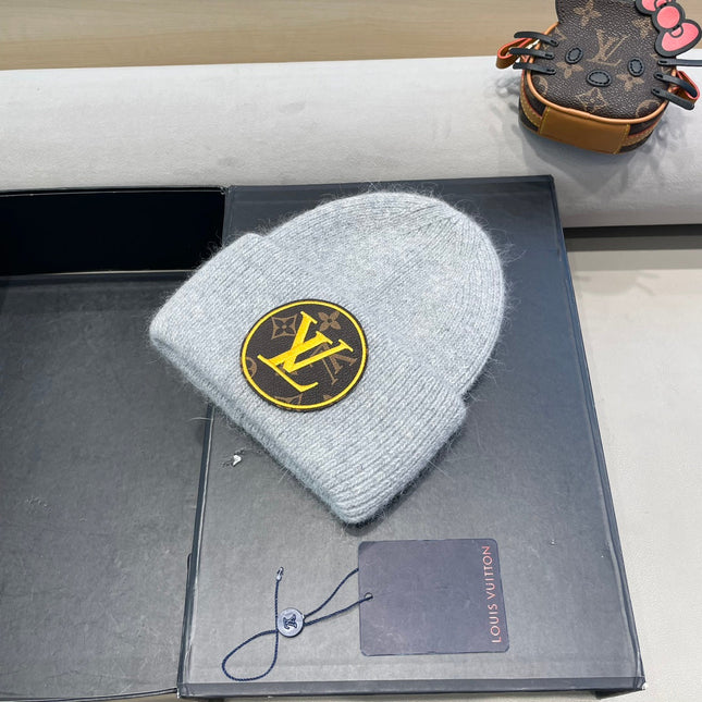 KNITTED BEANIE HAT IN LIGHT GRAY WOOL AND RABBIT FUR 417755