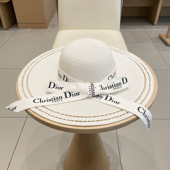 HAT IN WHITE RAFFIA WIDE-BRIM MIX BIG WHITE BOW