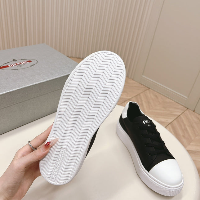 PRA LOGO OUTLET BASIC SNEAKERS BLACK AND WHITE TOE CALFSKIN