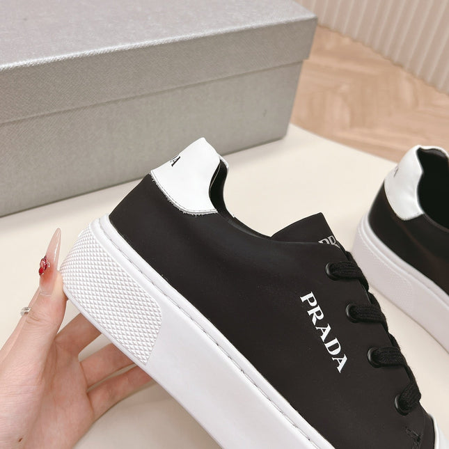 PRA LOGO OUTLET BASIC SNEAKERS BLACK AND WHITE TOE CALFSKIN