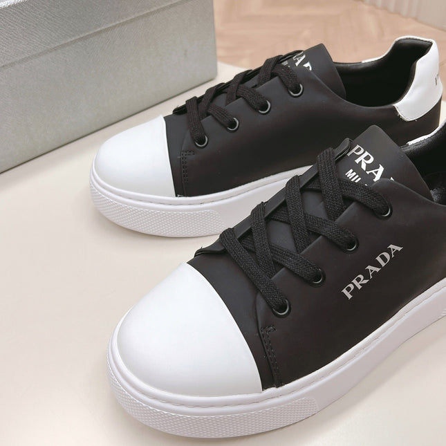 PRA LOGO OUTLET BASIC SNEAKERS BLACK AND WHITE TOE CALFSKIN