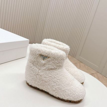 SNOW ANKLE BOOTS IN WHITE SHEARLING