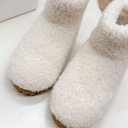 SNOW ANKLE BOOTS IN WHITE SHEARLING