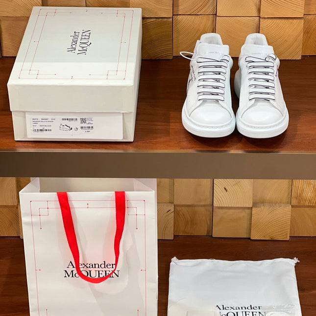 OVERSIZED SNEAKERS IN WHITE CALFSKIN CARTOON FIGURE BLACK TRIM LACES