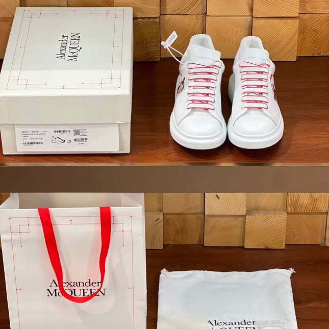 OVERSIZED SNEAKERS IN WHITE CALFSKIN WITH CARTOON FIGURE