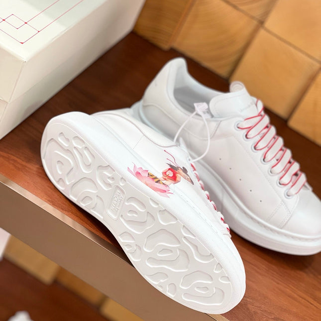 OVERSIZED SNEAKERS IN WHITE CALFSKIN WITH CARTOON FIGURE