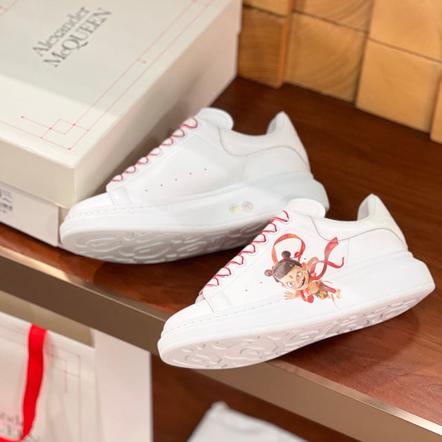OVERSIZED SNEAKERS IN WHITE CALFSKIN WITH CARTOON FIGURE