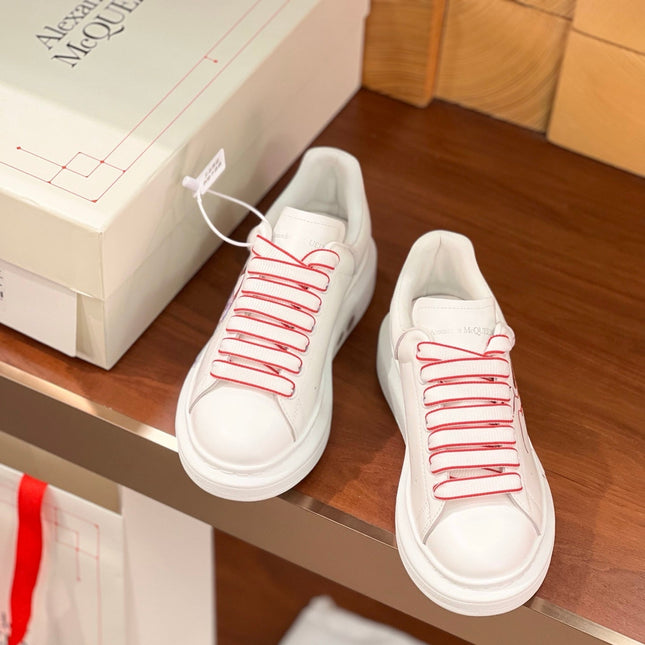 OVERSIZED SNEAKERS IN WHITE CALFSKIN NATRA GRAPHIC RED TRIM LACES