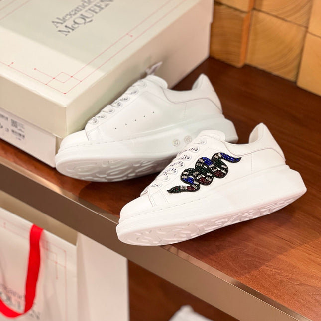 OVERSIZED SNEAKERS IN WHITE CALFSKIN EMBROIDERED MULTICOLOR SNAKE