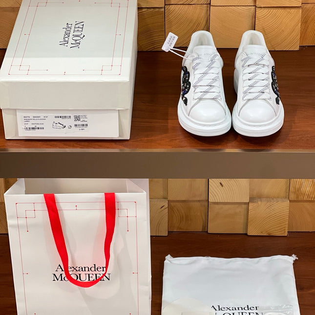 OVERSIZED SNEAKERS IN WHITE CALFSKIN EMBROIDERED MULTICOLOR SNAKE