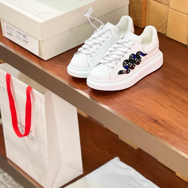 OVERSIZED SNEAKERS IN WHITE CALFSKIN EMBROIDERED MULTICOLOR SNAKE