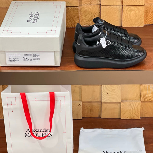 OVERSIZED SNEAKERS IN BLACK GLOSSY CALFSKIN SNAKE-EFFECT