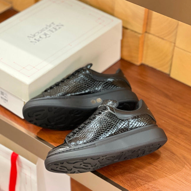 OVERSIZED SNEAKERS IN BLACK GLOSSY CALFSKIN SNAKE-EFFECT