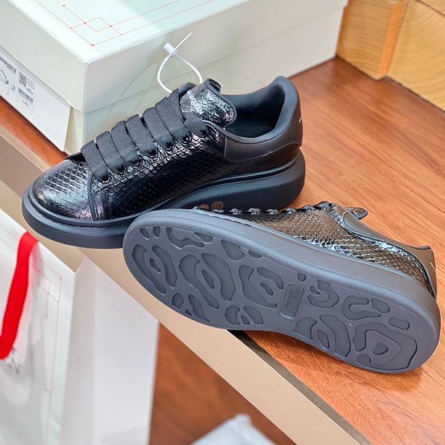 OVERSIZED SNEAKERS IN BLACK GLOSSY CALFSKIN SNAKE-EFFECT