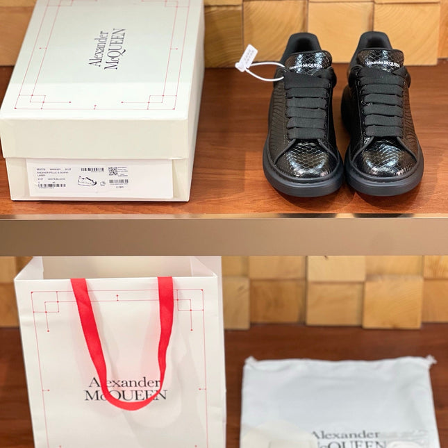 OVERSIZED SNEAKERS IN BLACK GLOSSY CALFSKIN SNAKE-EFFECT