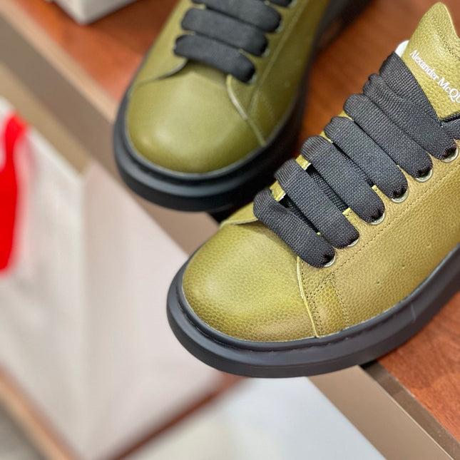 OVERSIZED SNEAKERS IN ARMY GREEN CALFSKIN