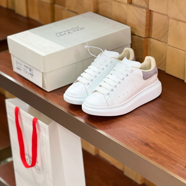 OVERSIZED SNEAKERS IN WHITE CALFSKIN WITH THISTLE PURPLE SUEDE HEEL TAB