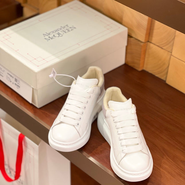 OVERSIZED SNEAKERS IN WHITE CALFSKIN WITH THISTLE PURPLE SUEDE HEEL TAB