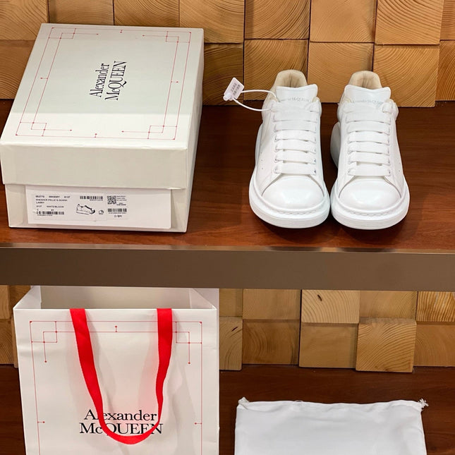 OVERSIZED SNEAKERS IN WHITE CALFSKIN WITH THISTLE PURPLE SUEDE HEEL TAB