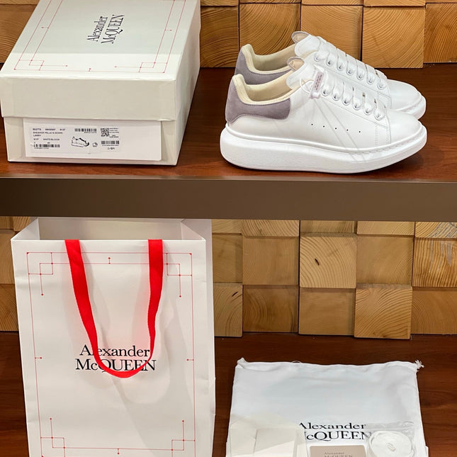 OVERSIZED SNEAKERS IN WHITE CALFSKIN WITH THISTLE PURPLE SUEDE HEEL TAB