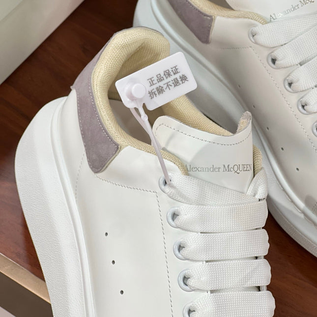 OVERSIZED SNEAKERS IN WHITE CALFSKIN WITH THISTLE PURPLE SUEDE HEEL TAB