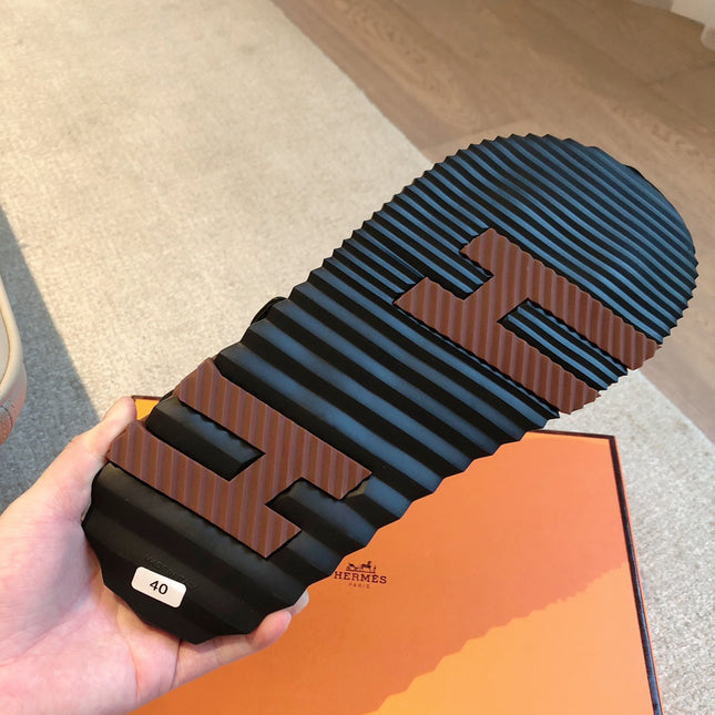 DAD SANDALS IN BLACK CALFSKIN AND RUBBER