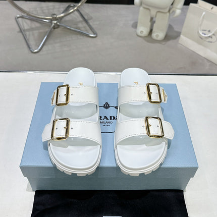 PRADA 25S STRAP SLIDES 30MM IN WHITE CALFSKIN GOLD HARDWARE