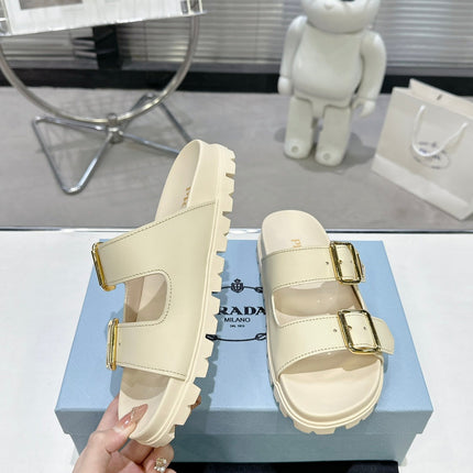 PRADA 25S STRAP SLIDES 30MM IN CREAM CALFSKIN GOLD HARDWARE