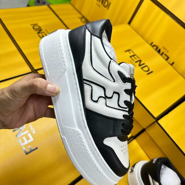 FENDI THICK-SOLDED SNEAKER IN WHITE AND BLACK LAMBSKIN