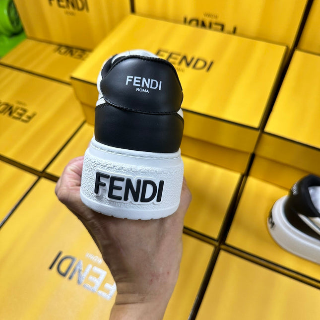 FENDI THICK-SOLDED SNEAKER IN WHITE AND BLACK LAMBSKIN