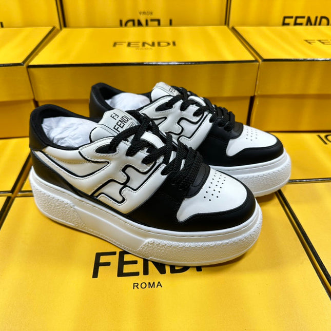 FENDI THICK-SOLDED SNEAKER IN WHITE AND BLACK LAMBSKIN