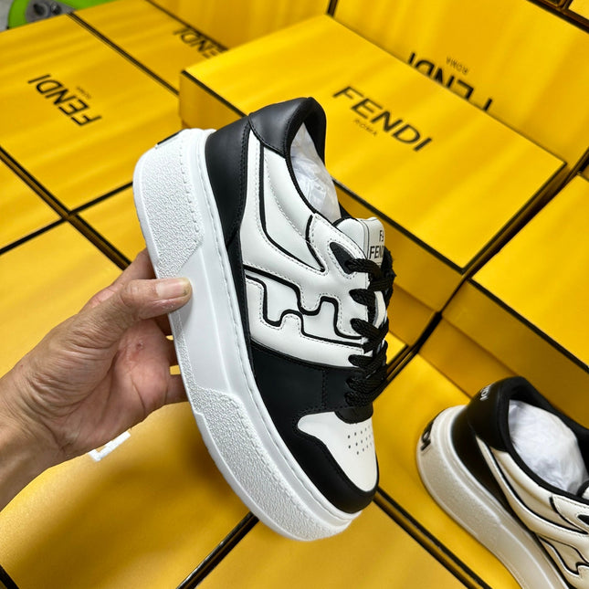FENDI THICK-SOLDED SNEAKER IN WHITE AND BLACK LAMBSKIN