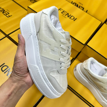 FENDI THICK-SOLDED SNEAKER IN WHITE SUEDE AND MONOGRAM FABRIC
