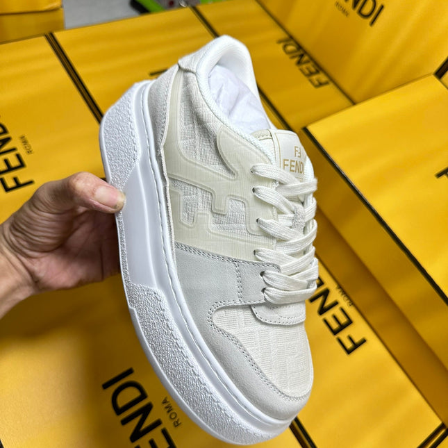 FENDI THICK-SOLDED SNEAKER IN WHITE SUEDE AND MONOGRAM FABRIC