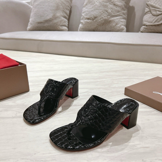 EMBOIDERED LOGO MULES IN BLACK EMBOSSED CALFSKIN