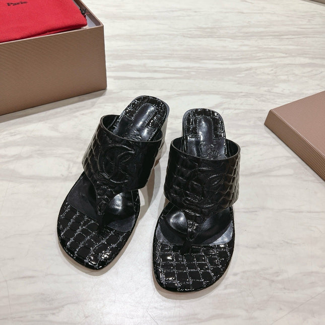 EMBOIDERED LOGO MULES IN BLACK EMBOSSED CALFSKIN