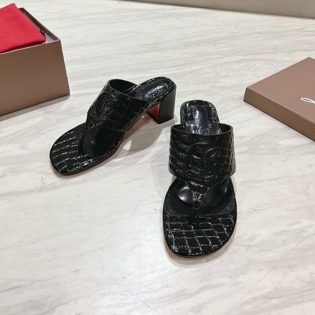 EMBOIDERED LOGO MULES IN BLACK EMBOSSED CALFSKIN