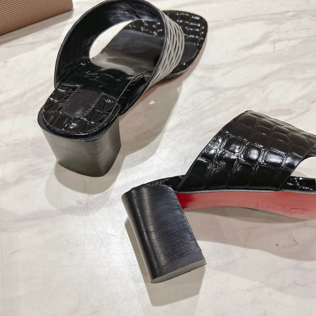 EMBOIDERED LOGO MULES IN BLACK EMBOSSED CALFSKIN