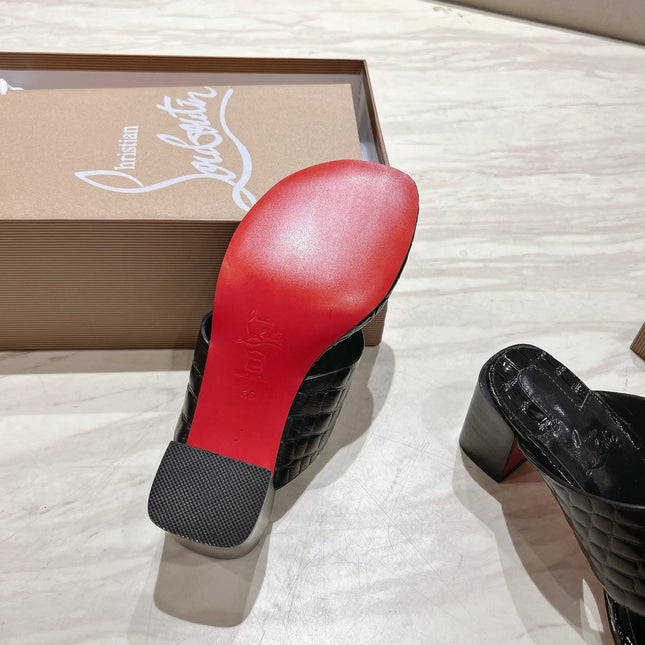 EMBOIDERED LOGO MULES IN BLACK EMBOSSED CALFSKIN