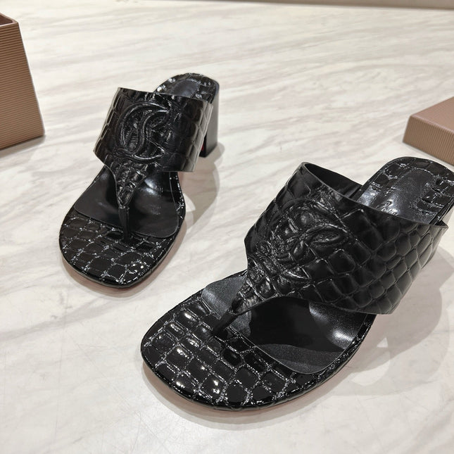 EMBOIDERED LOGO MULES IN BLACK EMBOSSED CALFSKIN