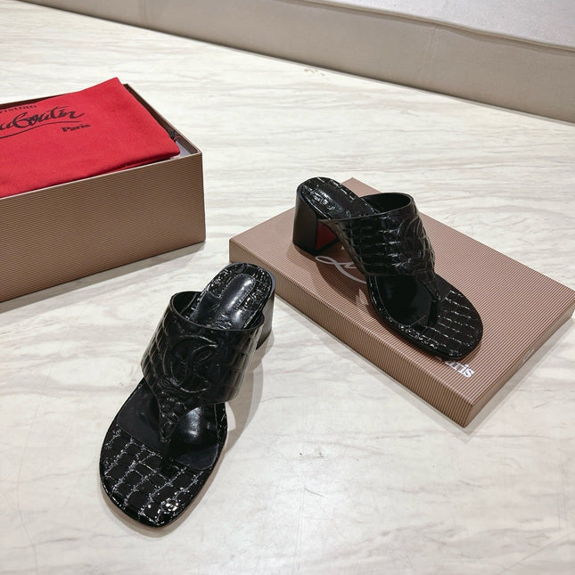 EMBOIDERED LOGO MULES IN BLACK EMBOSSED CALFSKIN