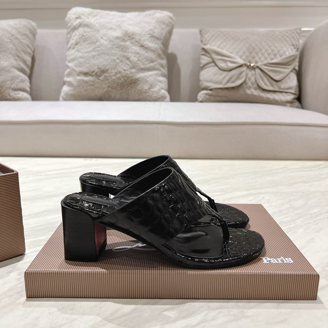 EMBOIDERED LOGO MULES IN BLACK EMBOSSED CALFSKIN