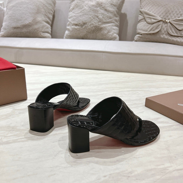 EMBOIDERED LOGO MULES IN BLACK EMBOSSED CALFSKIN