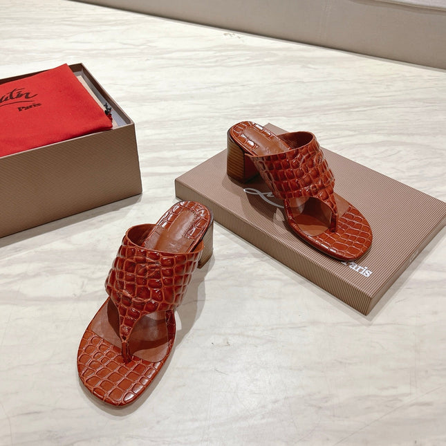 EMBOIDERED LOGO MULES IN COGNAC BROWN EMBOSSED CALFSKIN